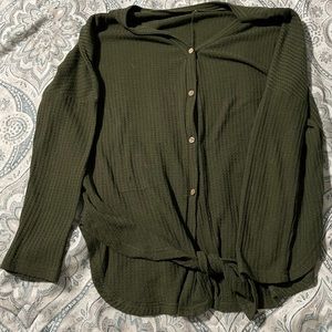 Green button up, tie bottom top.